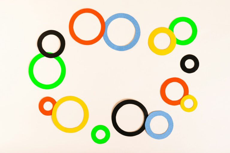 Olympics, Paris, France, summer, Multi-colored rings on a light background